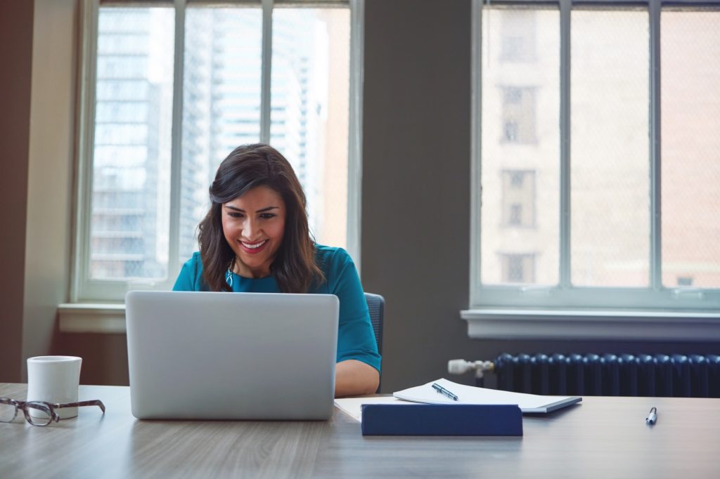 Reading the monthly employee e-newsletter